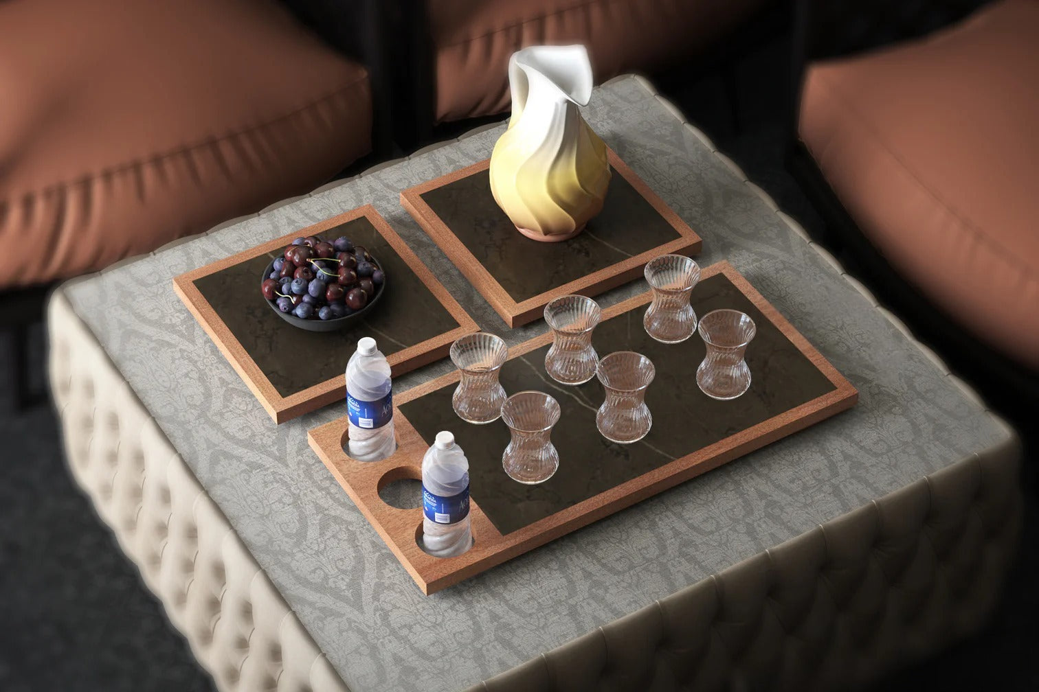 Tray with small glasses, bottles, and a fruit bowl on a textured surface.